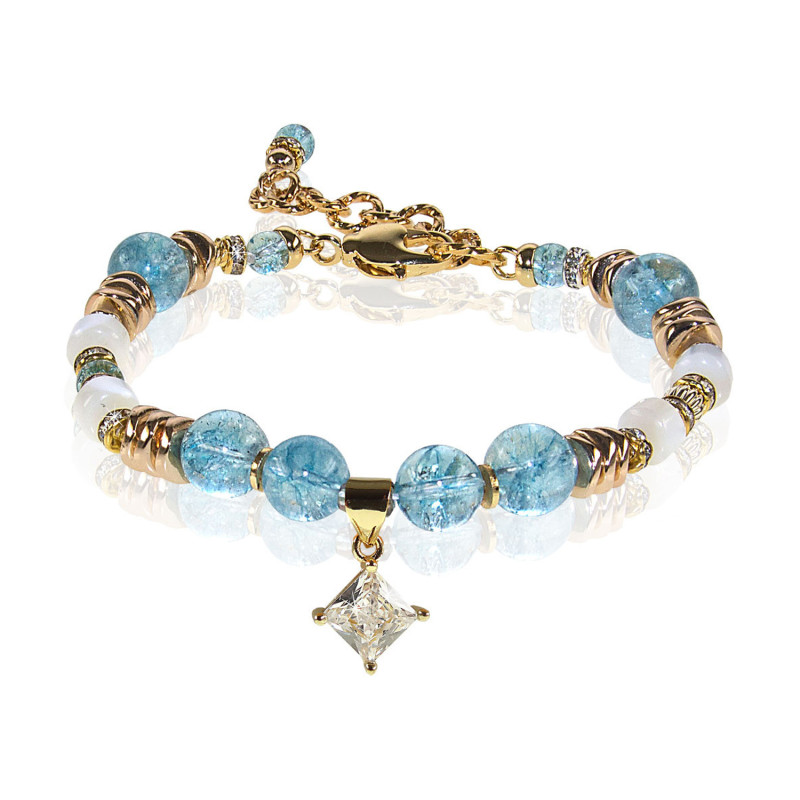 Athéna – Armband mit Blautopas, Perlmutt und Zirkonia Athéna – Armband mit Blautopas, Perlmutt und Zirkonia